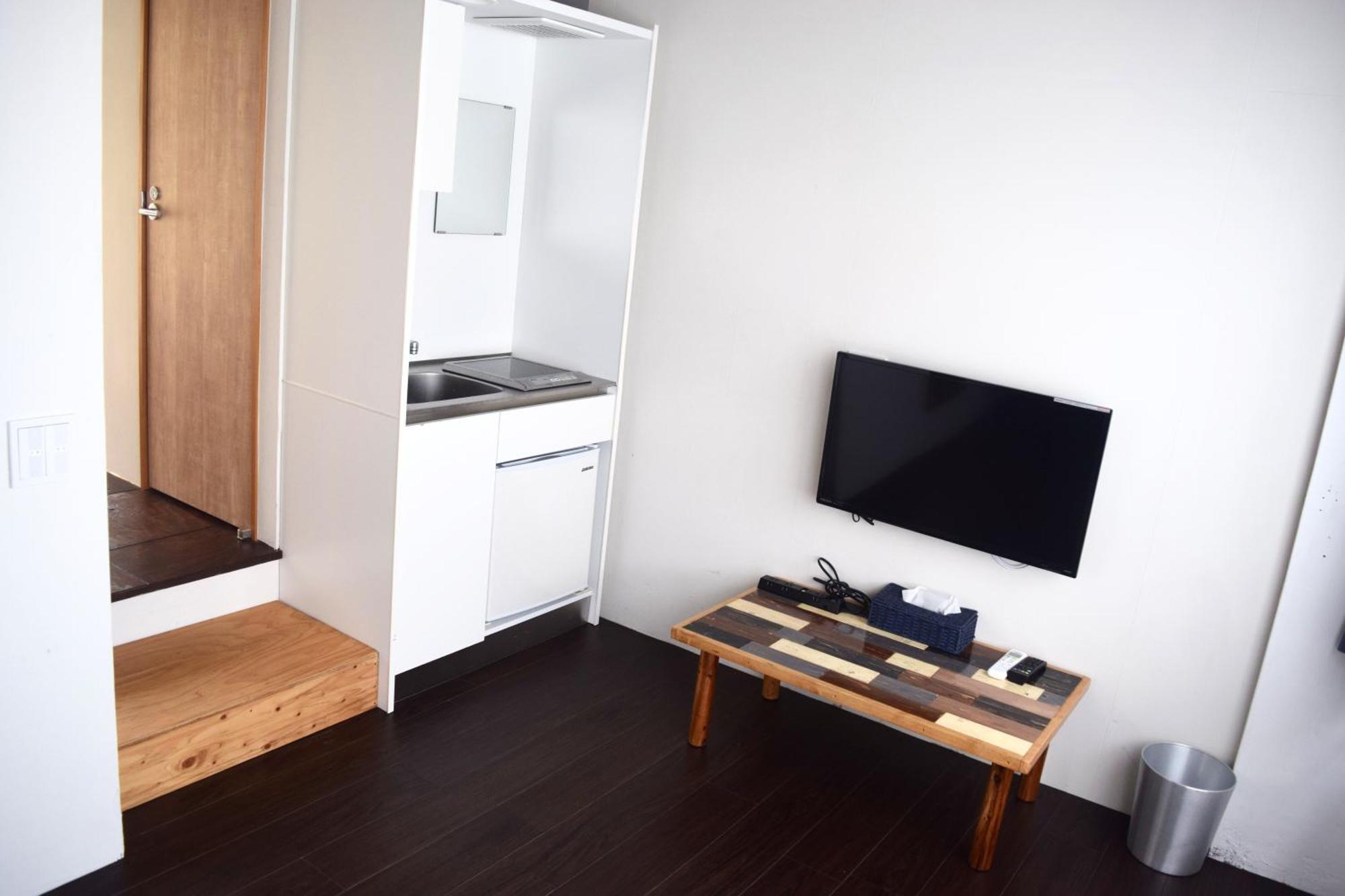 Guest House Golden Mile Hostel Amami Quarto foto